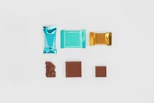 Flexible robotic system solution for chocolate squares and seasonal shapes