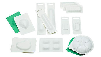 Paper packaging for UK SMARTIES® tablet with Syntegon Technology